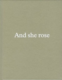 AND SHE ROSE